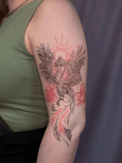 Phoenix with an ornamental sun and red peonies in fine line style