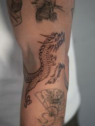 Minimalist Dragon Tattoo