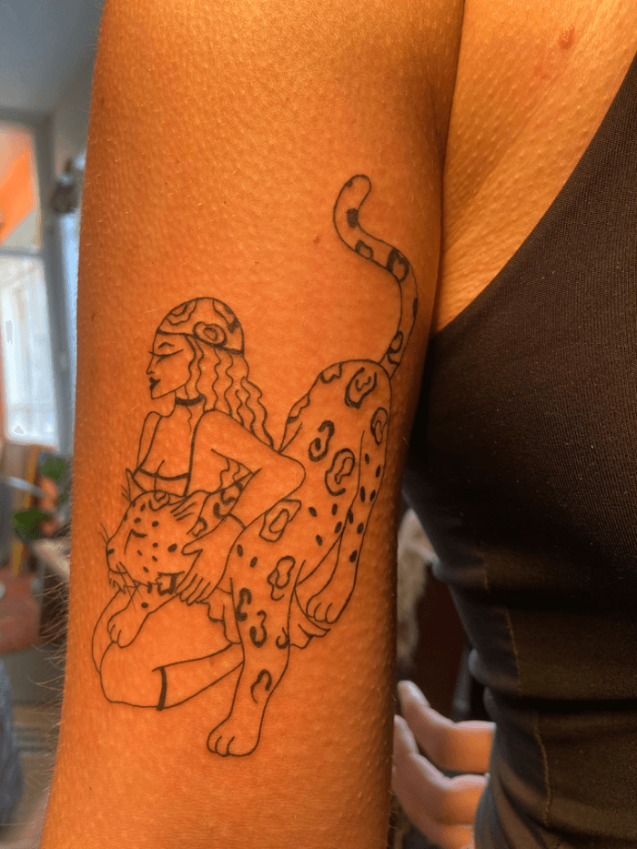 woman-and-leopard-tattoo-tattoodo