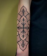 Intricate Ornamental Blackwork Forearm Tattoo