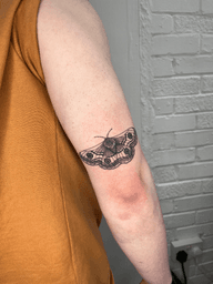 blackwork moth tattoo