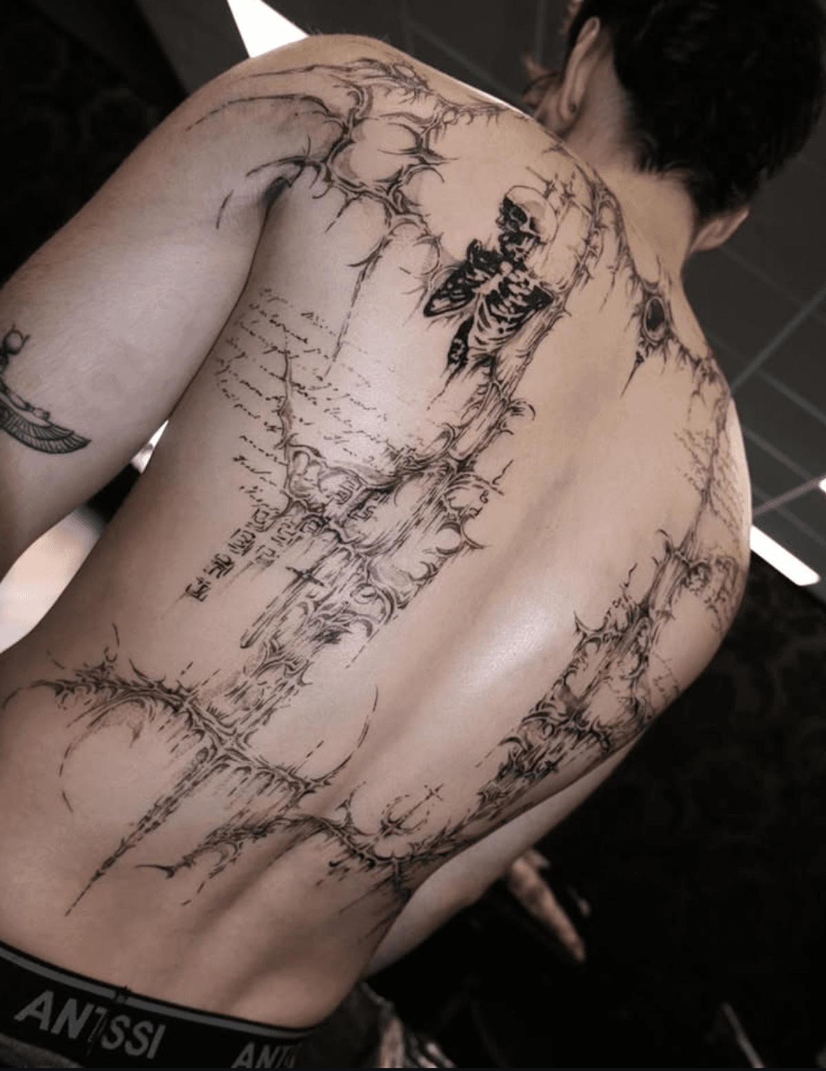 delicate arm tattoo