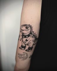 A T-Rex embracing its darker side.🦖🖤...#TattooArt #DinoTattoo #EmoTattoos #AlternativeTattoo #BlackworkTattoo #GothTattoo #CuteTattooDesign #trextattoo #UniqueTattoo #Inkspiration #TattoosOfInstagram #ArtistLife #gothanimals #cutetattoo