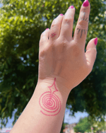 Swirl and Star Tattoo