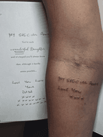 This a healing session, handwriting tattoo in a memory of her dad 
