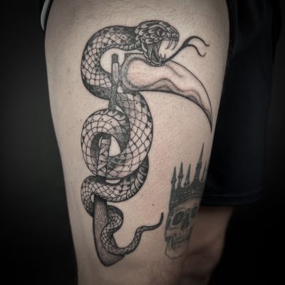 Captivating black and gray dotwork design by Jenny Dubet, featuring a striking snake and scythe motif.