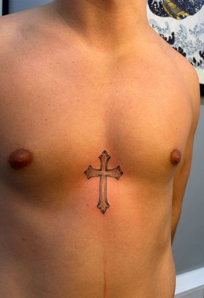 Experience Sally's exquisite illustrative style with this elegant black & gray cross tattoo. Perfect for showcasing your faith.