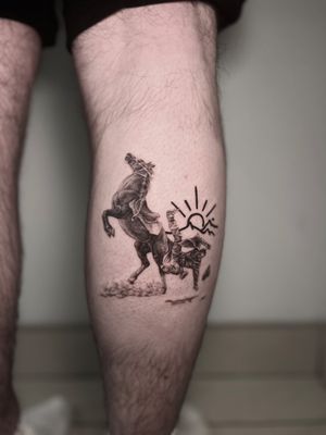 Micro-realism black and gray tattoo of a western cowboy riding a horse, by artist Lauren.