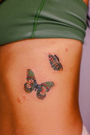 Capture the beauty of Korean dancheong patterns blended with a delicate butterfly in this illustrative tattoo by HWIZI.