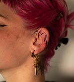 Ear adornments for Chelsea 🌿 .. #tattooapprentice #tattoo #tattoos #tattooartist #tattoodesign #tattooideas #blackwork #inked #tattooapprenticeship #femaletattooartist #linework #flashtattoo #tattooed #blackworktattoo #tattooist #tattooing #blackandgreytattoo #tattooinspiration #eartattoo #orlandotattooartist #altamontesprings