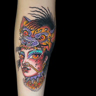 Woman with Tiger Mask Tattoo