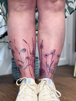 Double lower leg wrap with use of real pressed flowers foraged by myself, with additions of drawn flowers that are based in the uk and South Africa to represent identity! 