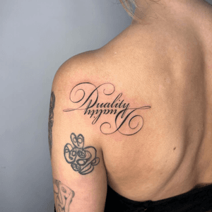 Small lettering tattoo style