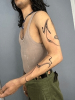 Winding Arm Tattoo