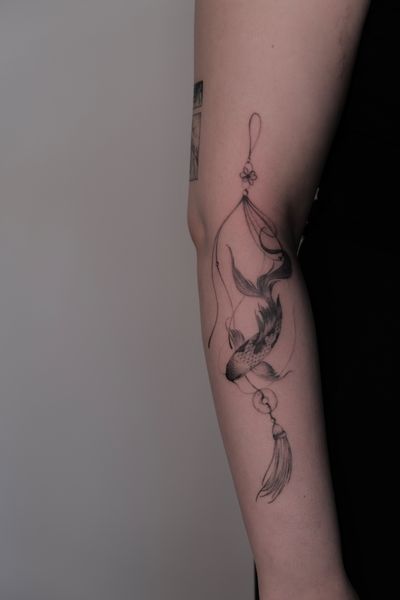 Koi fish with an Asian knot