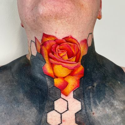 Realistic red and yellow rose on the throat 