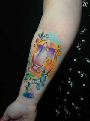 Illustrative tattoo featuring a beautiful flower, a charming duck, duckling, and an elegant frame. Designed by Cloto.tattoos.