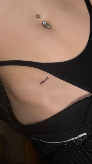 Small lettering tattoo style