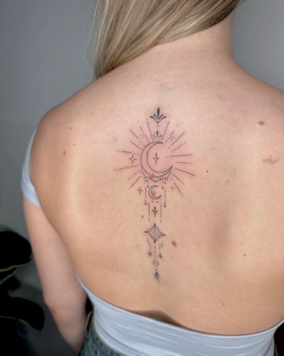 Embrace the balance of light and dark with this intricate sun and moon design by jadeshaw_tattoos. Perfect for those seeking celestial inspiration.