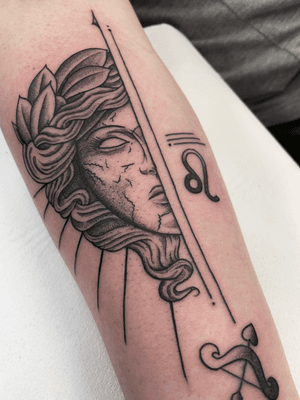 Get mesmerized by this stunning black and gray tattoo of a Greek mythology statue, beautifully illustrated by Marc ‘Cappi’ Caplen.