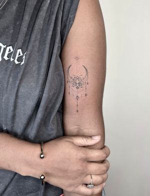 Unique dotwork and fine line design featuring a moon and lotus motif, expertly crafted by Alina Amberland.