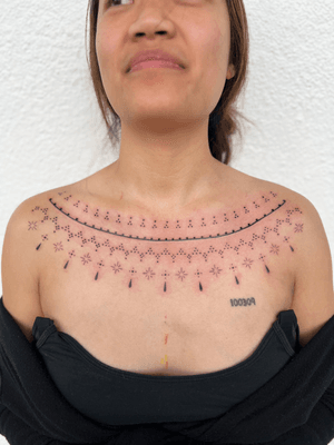 Detailed ornamental blackwork pattern tattoo created by Cecelia Ercolino.