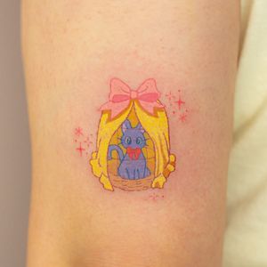 Get inked with a cute Sailor Moon inspired kitty by Mika Tattoos. Colorful and adorable, this design will make you purr with delight.