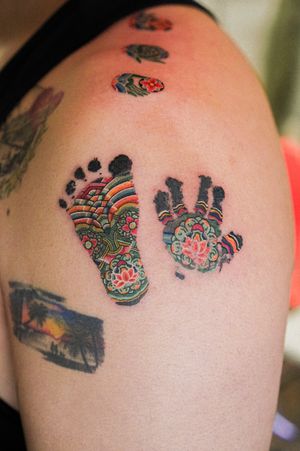 Illustrative tattoo featuring traditional Korean print pattern on hand and feet by HWIZI.