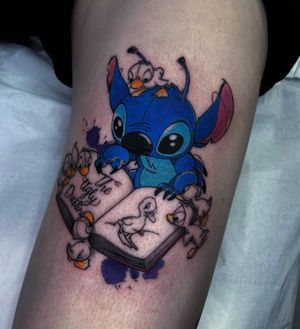 A delightful anime illustration featuring Stitch, Lilo & Stitch, and a playful duck. Perfect for Disney fans and tattoo enthusiasts alike.
