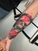 Chaotic Skull Forearm Tattoo