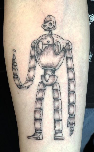 Get enchanted by this illustrative Studio Ghibli tattoo featuring a Laputian robot trooper from Laputa: Castle in the Sky, by Amandine Canata.