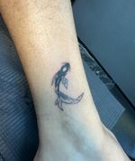 Minimalist Koi Fish Tattoo