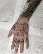 Lightning Bolt Hand Tattoo