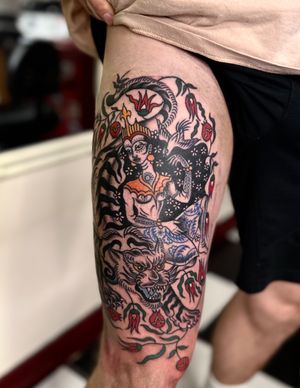 Experience the power and beauty of a tiger deity in this stunning illustrative tattoo by Omar Al Kaissi. Evoking ancient Arabic mystique.