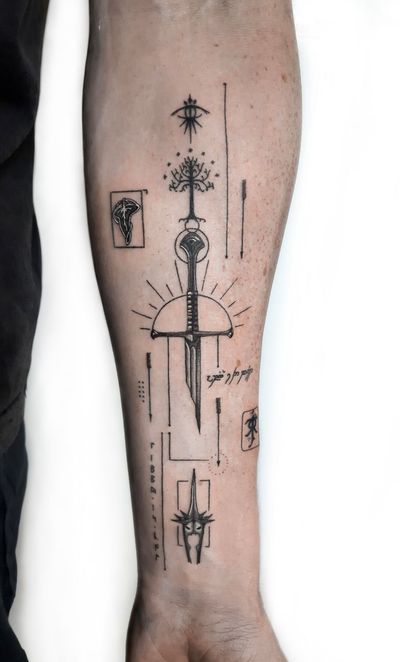 Experience the magic of Middle Earth with this stunning black and gray geometric sword tattoo by Liberty C Tattoo.