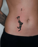 Person Hanging from a String