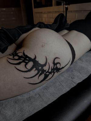 Blackwork tattoo by Oliver Soames featuring ornamental neotribal design.