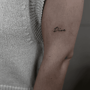 Small lettering tattoo style