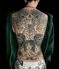Healed black n grey Satanic back piece