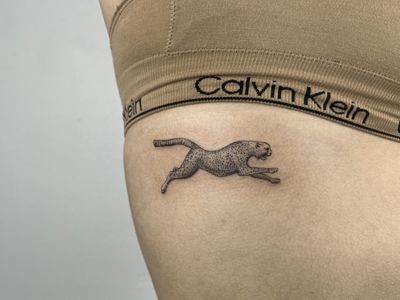 Fine-line cheetah in stride n the ribs, done in black & greywash inks. Done at B36 Tattoo on Melrose Ave. In Los Angeles!