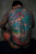 Vibrant Japanese Dragon Back Tattoo