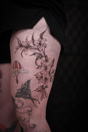 Experience the beauty of delicate floral design with this ornamental fine line tattoo by renowned artist Steffan Eagle.