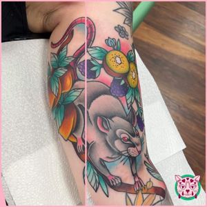 Neo-traditional tattoo by Ryan Mckenzie featuring kiwi, blackberry, and peach motifs in a playful design.