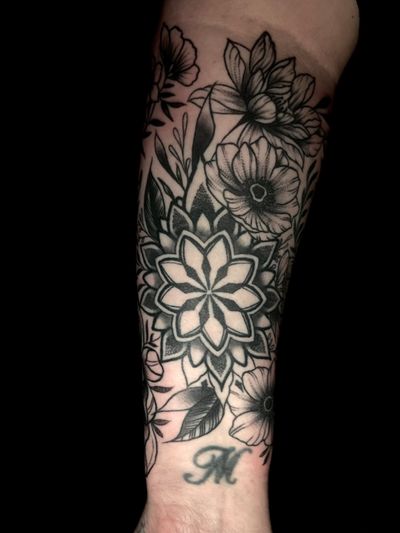 Elegant dotwork design by Ben Twentyman featuring detailed flowers and mandala patterns.