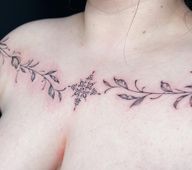 Delicate little chest piece🌿Thankyou babyg @_kat_4_ 🥰Now we kinda matching haha!!#tattooartist #tattoos #chesttattoo #botanical #leaftattoo #ornamentaltattoo #symmetricaltattoo