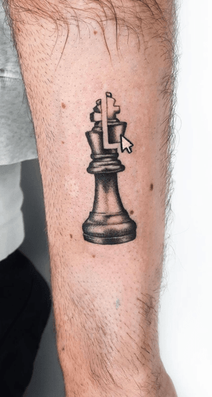 Blackwork tattoo by Liberty C Tattoo combining arrow, chess, and king motifs in a micro-realism illustrative style