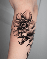 flower tattoo with eye