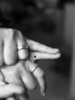 Matching Finger Heart Tattoos