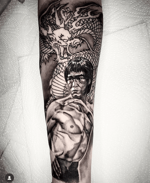 Mix of styles here, Bruce Lee influenced forearm piece.