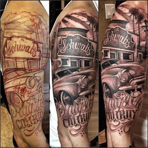 #freehandtattoo #car  #blackandgrey #halfsleeve Sleeve in progress by Macko with a low rider, lettering and a cityscape.